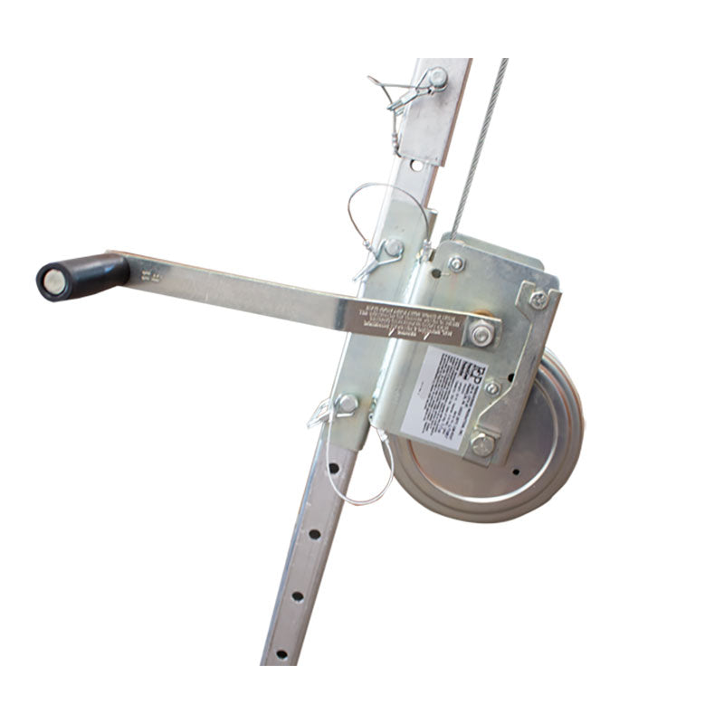 A close-up of the French Creek Production 50ft Galvanized Winch MW50G, featuring a handle, mounted on a perforated metal frame with cable and pulley, designed for confined space retrieval operations.