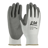 A pair of G-TEK CR Great White 13 Gauge PolyKor gloves by PIP, featuring a gray and white design with "G-Tek PolyKor" printed on the front. These polyurethane-coated gloves are textured for enhanced grip and are designed for protective use, offering superior cut resistance.