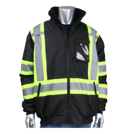 The PIP - Protective Industrial Products ANSI Type O Class 1 Value Two-Tone Bomber Jacket 331-1745 is showcased on a mannequin. This black waterproof winter workwear is designed with reflective yellow and gray stripes for high visibility and includes a zipper front, two side pockets, and a chest pocket with a transparent window.