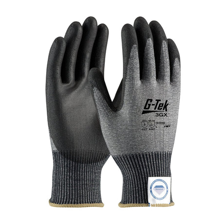 A pair of PIP G-Tek 3GX ECO Dyneema Phoenix gloves in black and gray, featuring ribbed cuffs. These gloves from Protective Industrial Products are polyurethane-coated for improved grip and have text and branding displayed on the back of the hand.