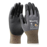 A set of black and gray PIP MaxiCut Ultra Nitrile MicroFoam A5 Gloves 44-5745E, from Protective Industrial Products, featuring a Nitrile Coated MicroFoam finish with "MaxiCut Ultra" and various symbols printed on them. These gloves offer a textured grip and are touchscreen compatible, providing both functionality and protection.