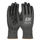 A pair of PIP G-Tek PolyKor gloves in gray featuring a nitrile coated foam grip on the palms and fingers, designed with touchscreen compatibility. The gloves have text on the back indicating cut resistance and model number 16-373.