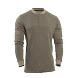 The NSA TECGEN FR Long Sleeve Henley C541N features advanced Carbon Fabric Technology and comes in an olive green color with slightly darker cuffs and neckline. It has a round neckline with three buttons and offers moisture-wicking capabilities, displayed on a white background.