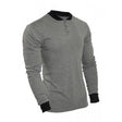 The NSA TECGEN FR Long Sleeve Henley, model C541N_ _BSLS_ _, features a grey design with moisture-wicking fabric and a three-button placket. It has black collar and cuffs that provide contrast against the carbon fabric technology. The shirt has no visible branding or patterns except for a subtle logo on the sleeve and is displayed against a white background.