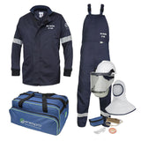 The NSA 12 Cal Enespro Arc Flash Jacket & Bib Overalls Kit, branded by NSA, is a protective gear set for electrical work. It includes a dark blue arc flash jacket crafted from Westex UltraSoft material to ensure compliance with NFPA 70E standards. Additionally, it comes with overalls, a helmet featuring a face shield, gloves, safety glasses, earplugs, and a blue carrying bag labeled "Enespro.