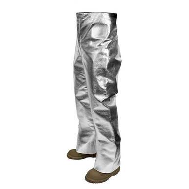 The NSA CARBON ARMOUR SILVERS 19 oz. Aluminized Pants T45NL_ _X32, featuring a sleek, reflective surface, provide radiant heat protection and are ideally paired with brown protective boots. These flame-resistant garments are crafted to ensure safety in high-heat environments.