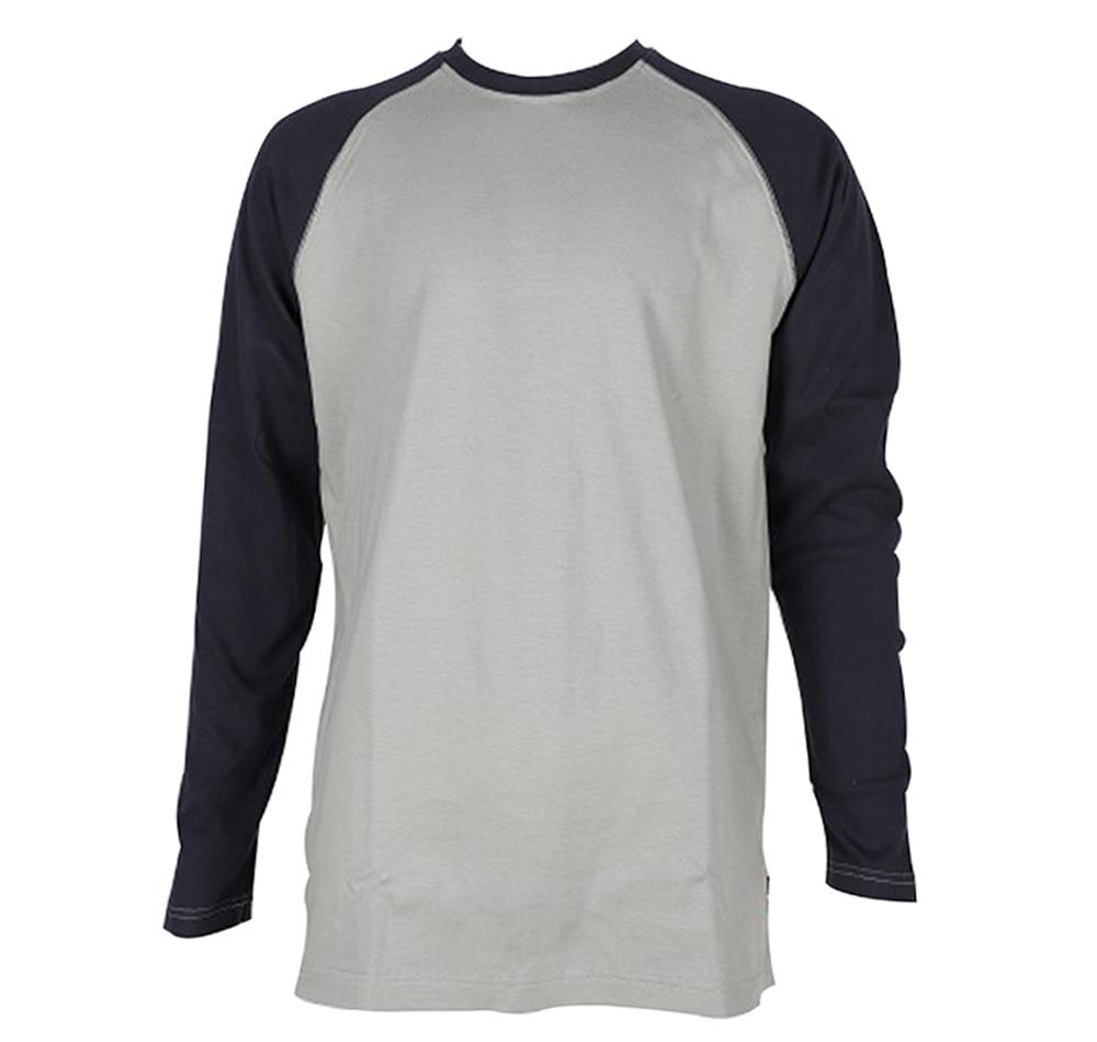 The ForgeFR Men's FR Baseball Tee MLFRBBT0021 is a long-sleeve, raglan-style shirt with a light gray body and black sleeves. Offering ATPV 11 cal/cm2 protection, it provides safety without compromising on style. Displayed on a white background, this tee meets NFPA 2112 standards for workplace safety.