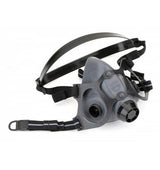 The Honeywell North 5500 Series Economical Thermoplastic Elastomer Half Mask is a black and gray respirator featuring adjustable straps and dual cartridge connections, designed to filter air. It includes a head strap and boasts a sleek, utilitarian design. NIOSH-approved, this North brand half mask is perfect for protection in hazardous environments.