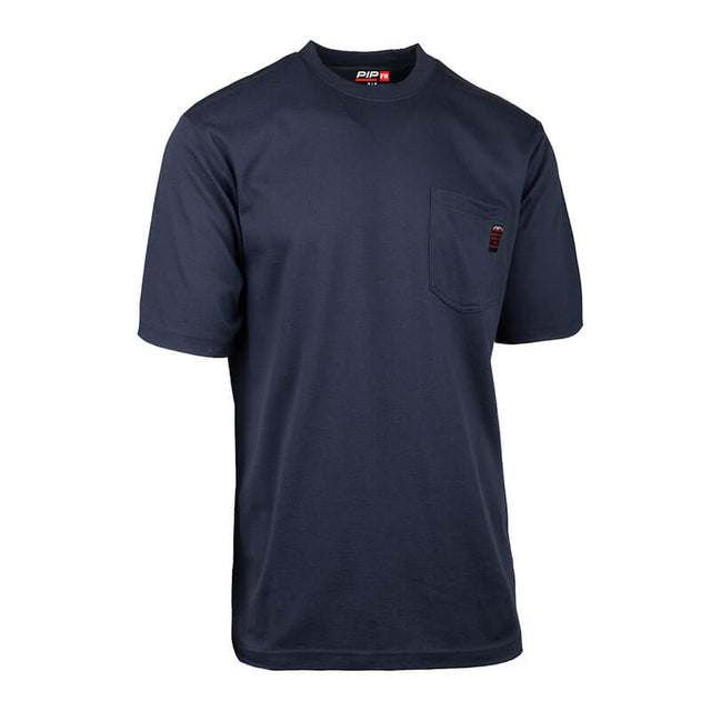 The PIP Navy Blue FR Short Sleeve T-Shirt 385-FRSSNV features a left chest pocket with a red and black tag, an inside collar label reading "PIP," and NFPA 70E arc flash protection.