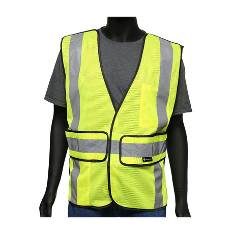 A mannequin is outfitted with a PIP Viz-Up 3 Pocket Expandable Mesh Breakaway Vest 4720 in Hi-Vis Yellow, featuring reflective silver stripes that meet ANSI Type R Class 2 standards, layered over a gray T-shirt. The vest has black trim and includes a convenient pocket on the left side. Its bright color and reflective tape stand out against the plain white background.