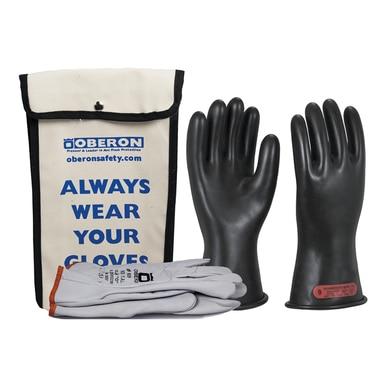 The Oberon Class 0 Rubber Electrical Glove Kit GLVKT-BRC0 includes a pair of black rubber electrical gloves offering outstanding insulating protection, a pair of gray leather gloves, and a white storage bag featuring the text "Oberon Always Wear Your Gloves," all designed to comply with NFPA 70E standards.