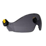 The Petzl VIZIR Eye Shield with EASYCLIP System features a dark tint and a curved design with a yellow adjustment knob on the side, making it ideal for use with VERTEX and STRATO helmets. Thanks to its EASYCLIP system, it attaches quickly and provides reliable protection against projectile hazards.