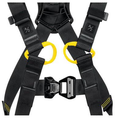 Close-up of the Petzl Newton International Harness C073BA0 in black, showcasing yellow rings and adjustable straps with A/2 labels. Its lightweight and ergonomic design by Petzl ensures safety without compromising comfort.