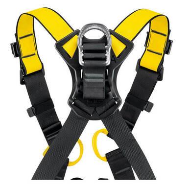 The Petzl Newton International Harness C073BA0 by Petzl is a black and yellow ergonomic fall arrest harness featuring adjustable straps and a lightweight metal ring centerpiece, designed for secure attachment and superior fall protection.