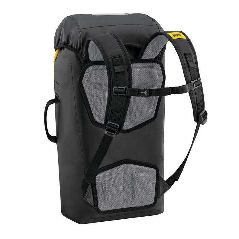 The Petzl TRANSPORT 30 Pack, from Petzl, is a black backpack featuring padded shoulder straps and a top flap design. It includes thermoformed foam for enhanced comfort and is built with side handles for versatile carrying options. The backpack has a sleek rectangular shape highlighted by yellow accents on the sides, ensuring durability and style.