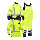 The PIP Bisley ANSI Extreme Cold 3 Piece Bundle includes a yellow and navy jacket, bib overalls, and a yellow long-sleeve shirt—all Class 3 safety gear with reflective stripes and thermal insulation for high visibility and warmth.