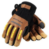 A pair of PIP Maximum Safety Kevlar Lined Journeyman Gloves 120-4100 in brown and black with yellow accents rests on a flat surface. These abrasion-resistant work gloves, featuring padded fingers and a label that reads "JOURNEYMAN-KV," are designed by Protective Industrial Products to ensure durability and protection during tough tasks.