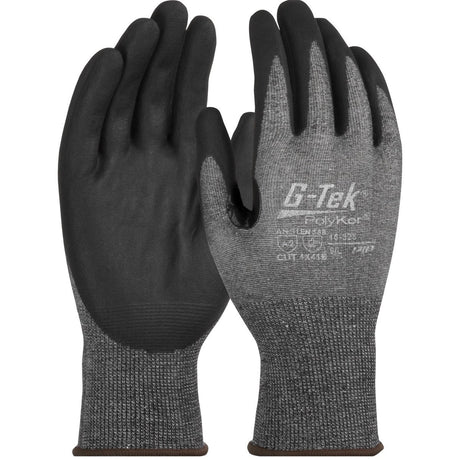 A pair of PIP G-Tek PolyKor Gloves by Protective Industrial Products features black nitrile-coated foam grips on the palms and gray fabric on the back. Designed for durability, grip, and touchscreen compatibility, these gloves also come with printed text and branding.