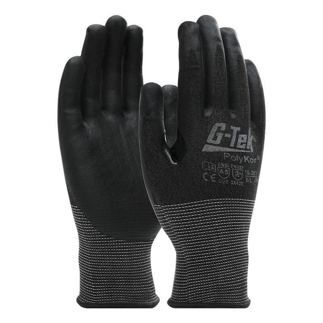 Introducing the PIP G-Tek PolyKor Glove with Nitrile Coated Foam Grip 16-351, a pair of black gloves that showcase textured palms and feature white "G-Tek" branding on the back. These gloves are designed with cut resistance, safety certifications, ribbed cuffs, and touchscreen compatibility to ensure durability and protection during work.