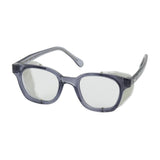 The PIP Traditional Spectacle Safety Glasses 249-5907-40, offered by Protective Industrial Products (PIP), feature clear lenses and side shields that comply with ANSI Z87.1+ standards. These glasses have a transparent frame for full visibility while ensuring enhanced protection and incorporating an anti-scratch coating for durable performance. Designed for safety, they also maintain a stylish appearance.