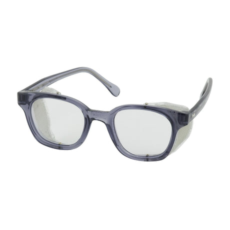 The PIP Traditional Spectacle Safety Glasses 249-5907-40, offered by Protective Industrial Products (PIP), feature clear lenses and side shields that comply with ANSI Z87.1+ standards. These glasses have a transparent frame for full visibility while ensuring enhanced protection and incorporating an anti-scratch coating for durable performance. Designed for safety, they also maintain a stylish appearance.