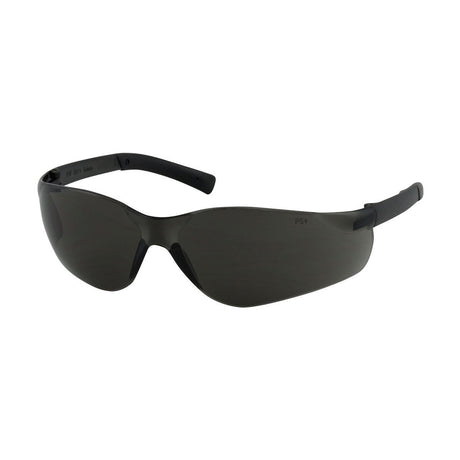 Introducing the PIP Zenon Z13 Anti-Scratch/Anti-Fog Safety Glasses, featuring a sleek black wraparound style with dark lenses, a semi-rimless design, and an added anti-scratch coating for enhanced durability. Each box contains 12 pairs from the trusted brand Protective Industrial Products (PIP).