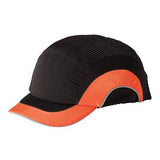 The JSP HardCap A1+ Bump Cap Short Brim 282-ABS150 by PIP - Protective Industrial Products boasts a stylish black and orange design, featuring a protective HDPE liner and mesh panels on the sides. It is accented with reflective piping along the orange rim of the visor and set against a plain white background, merging safety with style.