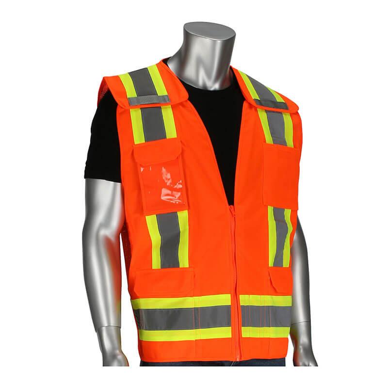 A mannequin showcases the PIP Two-Tone Breakaway Surveyors Vest from PIP - Protective Industrial Products, featuring bright orange fabric with yellow and gray reflective tape, layered over a black shirt. This Hi-Vis vest includes multiple front pockets for added convenience and enhanced safety.