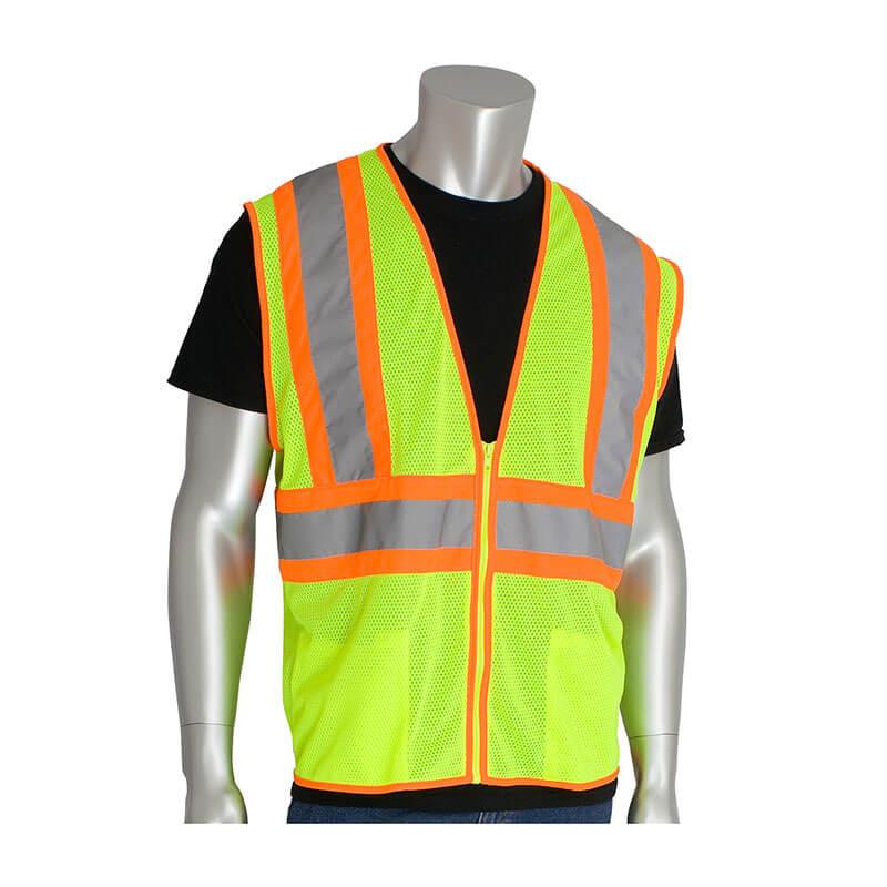 A mannequin showcases the PIP Type R Class 2 Two-Tone Value Mesh Vest 302-MV, a brilliant neon yellow safety vest from Protective Industrial Products. It features orange trim and reflective grey stripes and is worn over a black t-shirt. This essential piece of traffic safety equipment ensures high visibility with its striking design.