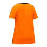 The image displays the back of a PIP Bisley Non-ANSI Women's Short Sleeve T-Shirt 310W1118 in orange, featuring a black collar trim. This plain shirt includes small side slits at the bottom hem and is enhanced with an antimicrobial treatment for increased freshness and durability.