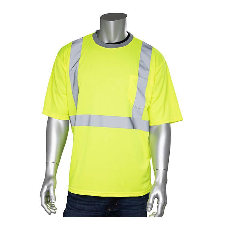 A mannequin showcases a high-visibility outfit, including the PIP Class 2 Short Sleeve T-shirt in a vibrant yellow, made from polyester mesh and accented with reflective silver tape, stylishly worn with dark trousers.