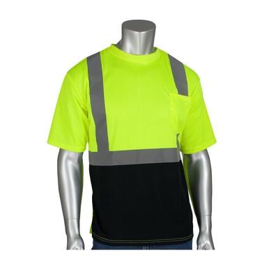 A mannequin showcases the PIP Class 2 UV Black Bottom Crew Neck T-Shirt 312-1250B-LY by Protective Industrial Products, highlighting a vibrant neon yellow top and a black lower section with reflective gray stripes. Made from moisture-wicking polyester, this t-shirt offers enhanced visibility and comfort for superior safety at work.