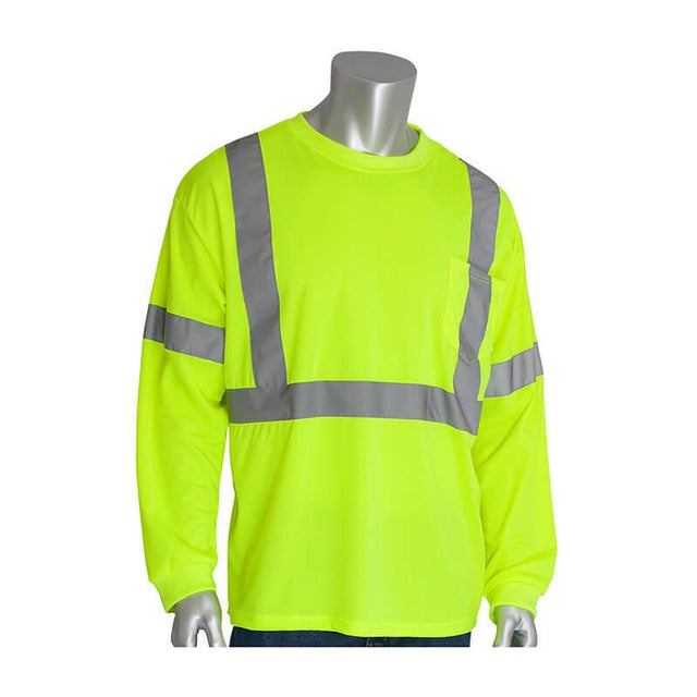 On display is the PIP ANSI Type R Class 3 Long Sleeve T-Shirt 313-1300 by Protective Industrial Products, featuring a vibrant fluorescent yellow polyester mesh design that highlights its high-visibility characteristics. Complete with reflective gray tape in both horizontal and vertical patterns and a chest pocket, this shirt significantly enhances visibility.