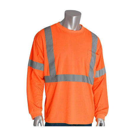 A mannequin models the PIP ANSI Type R Class 3 Long Sleeve T-Shirt 313-1300, crafted from durable polyester mesh by Protective Industrial Products. This hi-visibility shirt features reflective gray tape across the chest, shoulders, and arms. It is completed with a round neckline and a convenient left chest pocket.