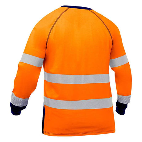 The PIP Bisley Long Sleeve Shirt w/Navy Bottom 313M6118T, from Protective Industrial Products, is a high-visibility garment in bright orange complemented by reflective silver tape across the chest, back, and arms. It features long sleeves with navy cuffs and collar for added contrast. The fabric also includes an antimicrobial treatment to ensure freshness throughout your workday.