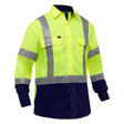 The PIP Bisley Long Sleeve Work Shirt w/X-Airflow 313M6491H, by Protective Industrial Products, is equipped with a high-visibility design featuring bright yellow-green fabric, reflective silver stripes, and dark blue accents. It includes X-Airflow Ventilation for enhanced comfort, chest pockets, a button-down front, and meets ANSI Class 3 standards.