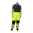 A mannequin showcases the PIP Insulated Bib Pants with Black Trim 318-1775 in high-visibility yellow and black, complete with reflective bands at the knees. Paired with a stylish dark gray shirt, this ensemble from Protective Industrial Products (PIP) guarantees safety and warmth on chilly days.