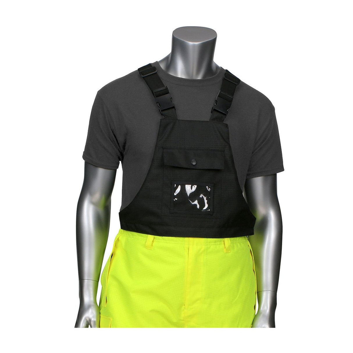 A mannequin is dressed in a dark gray T-shirt, a black tactical-style chest rig featuring a front pocket, and PIP Insulated Bib Pants with Black Trim 318-1775 in neon yellow. These high visibility pants ensure you're seen, while the chest rig straps over the shoulders to secure across the chest.