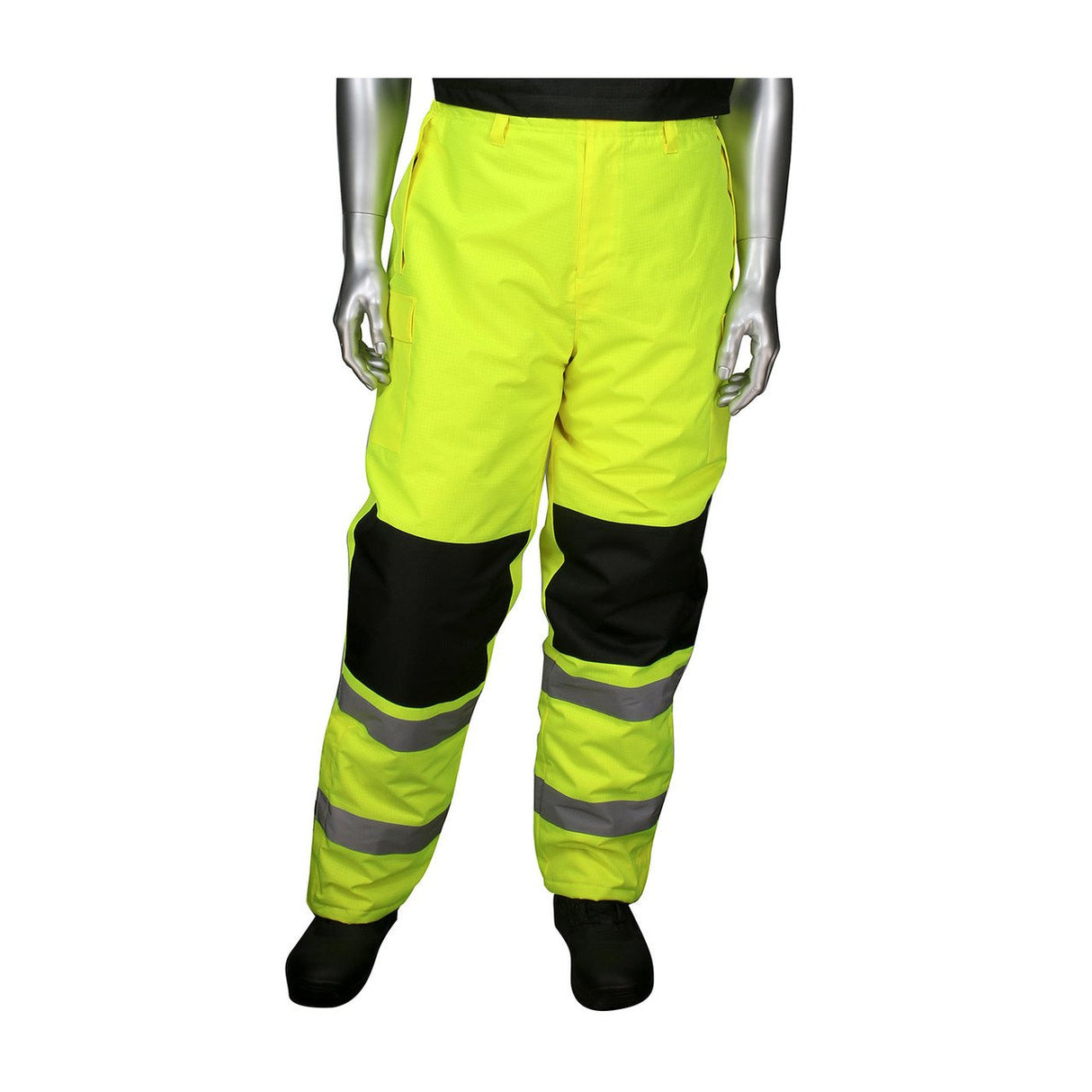 A mannequin exhibits the PIP Insulated Bib Pants with Black Trim 318-1775 from PIP - Protective Industrial Products. The high visibility winter workwear pants, in bright yellow, feature reflective grey and black panels and include side pockets. They are paired with black shoes against a plain white backdrop.