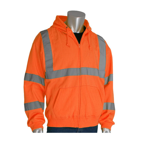 A mannequin displays the PIP ANSI Type R Class 3 Hooded Sweatshirt 323-HSSE from Protective Industrial Products, a vibrant orange safety hoodie with gray reflective tape running across the chest, sleeves, and waist. This high-visibility garment comes equipped with a drawstring, front pockets, and a zipper closure.