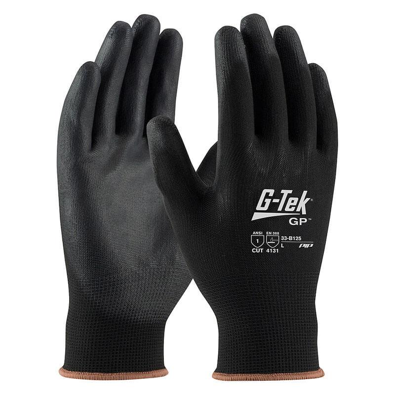 A pair of black PIP G-Tek Knit Nylon Blend Gloves with the brand "PIP - Protective Industrial Products" printed on the back. These gloves have a polyurethane coated flat grip and are shown in an upright position against a white background.