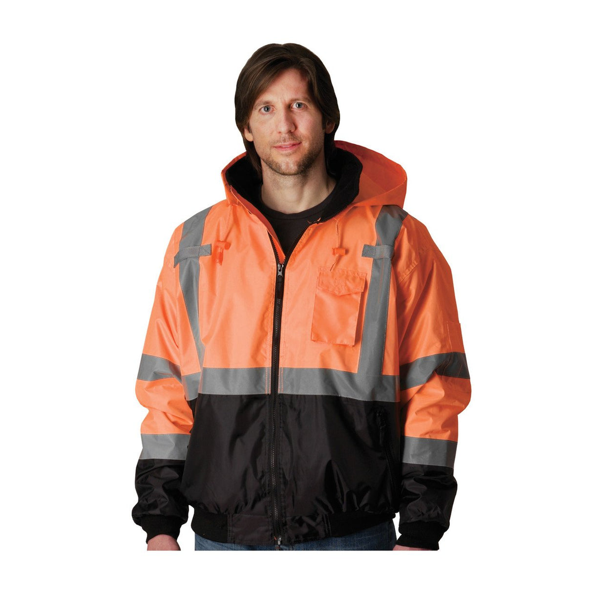 A person wearing a PIP Waterproof Reflective Value Bomber Jacket 333-1766 stands facing forward, showcasing the orange and black high-visibility garment with reflective stripes. This ANSI Class 3 jacket from Protective Industrial Products features a hood and a chest pocket, all set against a plain white background.