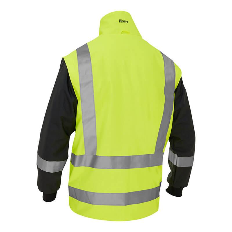 The PIP Bisley 5-in-1 Ripstop Jacket w/Zip-Out Inner Jacket 333M6375H, from Protective Industrial Products, boasts a bright yellow front and back with reflective silver stripes for high visibility. Its black sleeves and high collar add a touch of style, while the word "Bisley" prominently appears on the back. Made from waterproof polyester, this jacket is engineered to withstand any weather conditions with exceptional durability.