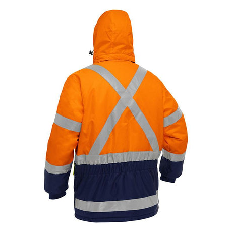 A person is wearing the PIP Bisley X-Back Extreme Cold Jacket w/Navy Bottom 343M6450X, featuring an orange and navy color scheme with reflective stripes. This jacket from PIP - Protective Industrial Products is designed for extreme cold protection and includes a hood for thermal insulation. The individual is pictured from the back against a white background.