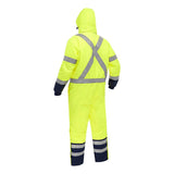 A person is wearing a PIP Bisley Extreme Cold Coverall with X-Back 344M6453X from Protective Industrial Products, which is designed for thermal protection. The bright yellow reflective safety jumpsuit includes gray reflective stripes on the back, arms, and legs, and features DuPont Sorona Aura dark blue sections on the cuffs and ankles. The individual is facing away from the camera.