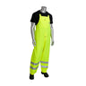 A mannequin is dressed in the PIP VizPLUS Waterproof Breathable Bib 353-2001, highlighting the high-visibility clothing with its reflective material at the bottom. The ensemble stands on a white background, showcasing PIP's durable workwear that blends safety with style.