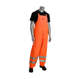 A mannequin displays high-visibility clothing, wearing PIP VizPLUS Waterproof Breathable Bib 353-2001 in orange with reflective material on the legs and a black t-shirt. The overalls, from PIP - Protective Industrial Products, feature shoulder straps and a front pocket, all set against a white background.