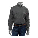 The mannequin is styled in a charcoal gray PIP AR/FR Dual Certified Ripstop Long Sleeve Workshirt 385-FRRS by Protective Industrial Products, featuring buttoned chest pockets and perfectly paired with dark blue jeans. A brown belt completes this rugged yet chic look, ideal for those seeking both style and durability.