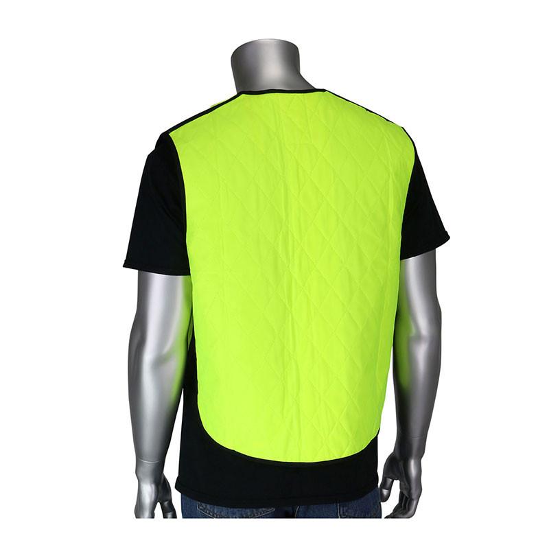 A mannequin showcases a PIP EZ-Cool Evaporative Cooling Vest 390-EZ100 over a black shirt. The vibrant yellow vest by PIP - Protective Industrial Products, designed to combat heat stress, features a quilted pattern that pops against the simple white background.