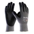 The PIP MaxiFlex Ultimate AD-APT Gloves 42-874, available in a pack of 12 pairs, feature a black and gray color scheme with a nitrile-coated micro-foam grip for exceptional handling. These gloves from Protective Industrial Products offer a breathable design with a textured wrist area, ensuring both comfort and functionality. Positioned upright against a white background, their sleek appearance is emphasized.